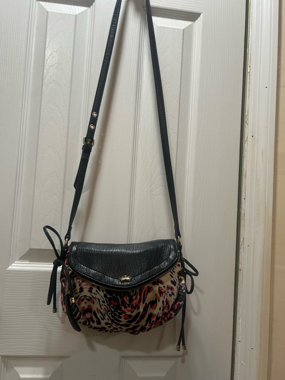 Cute  Juicy Coulture small crossbody animal print &black faux leather bag